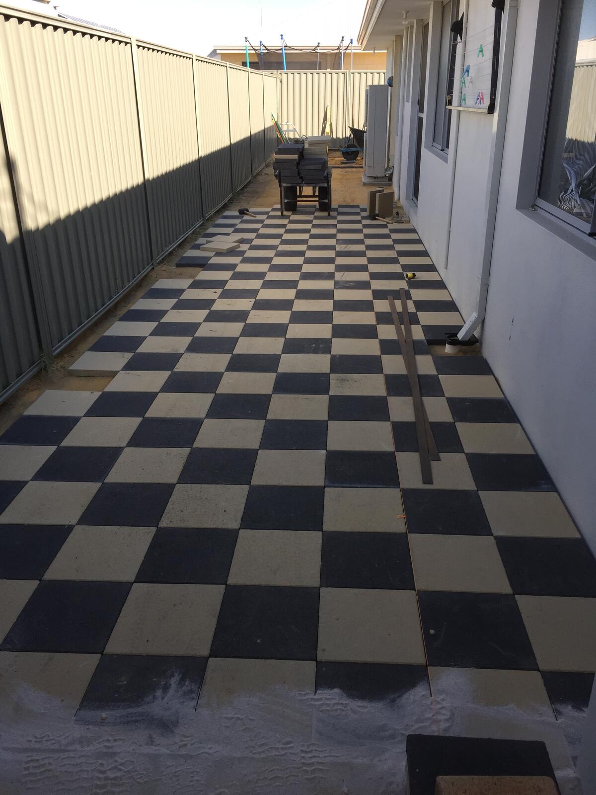 Two-tone checkerboard paving side path