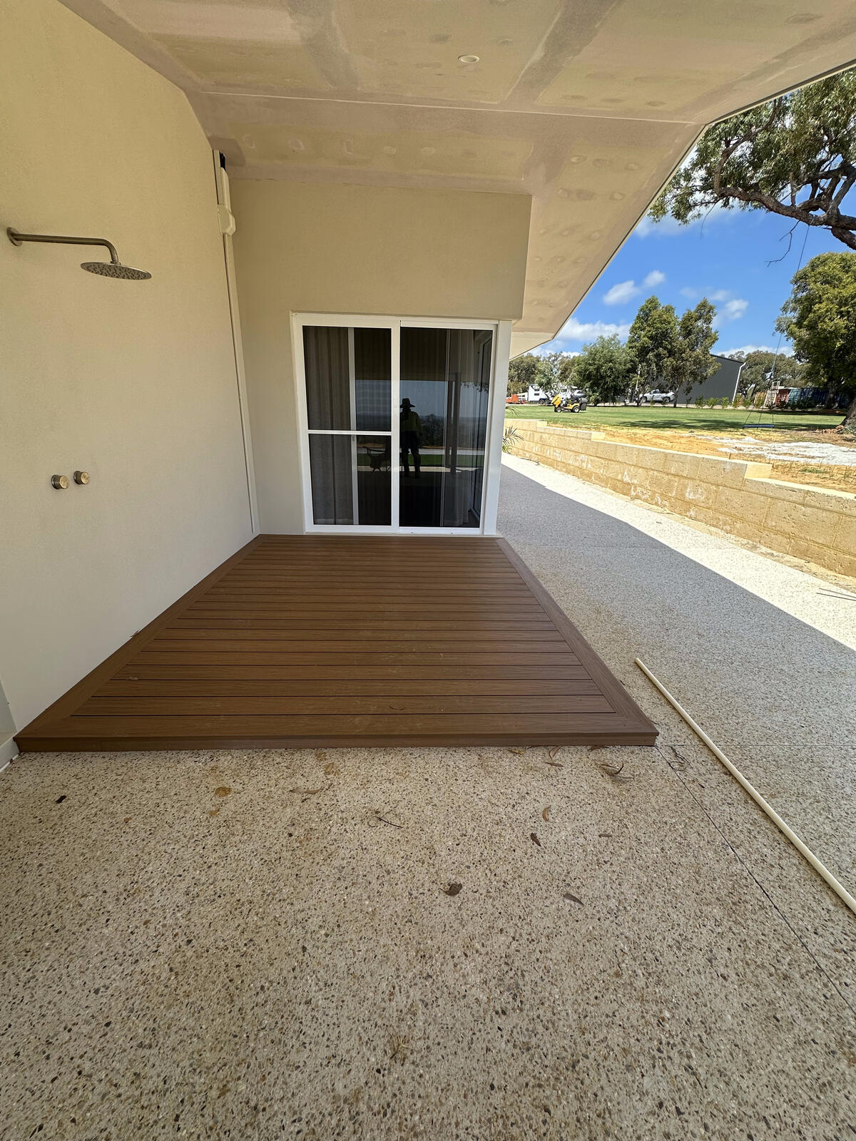 Composite decking installed with an outdoor shower