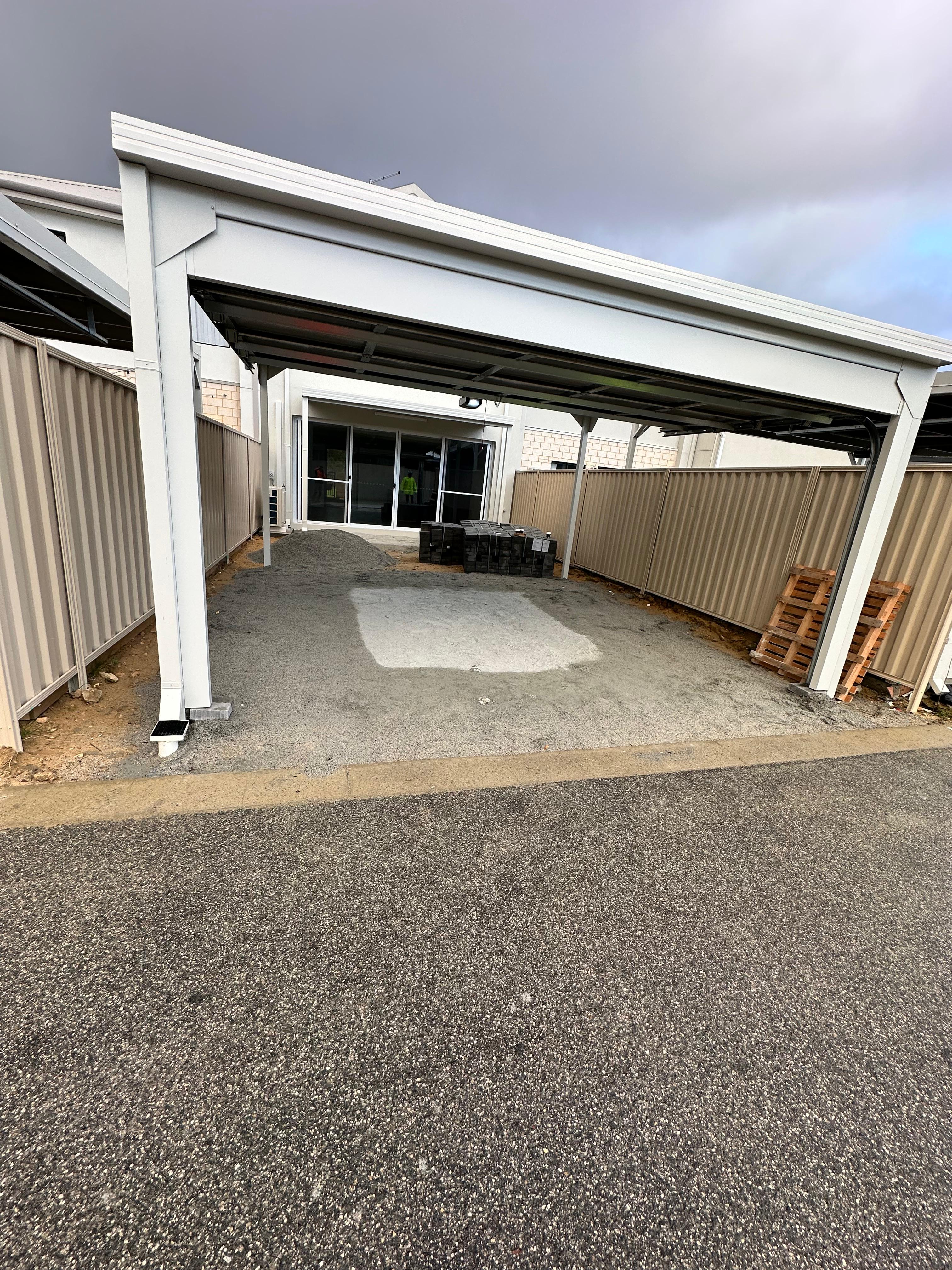 Carport paving job in progress before final surface