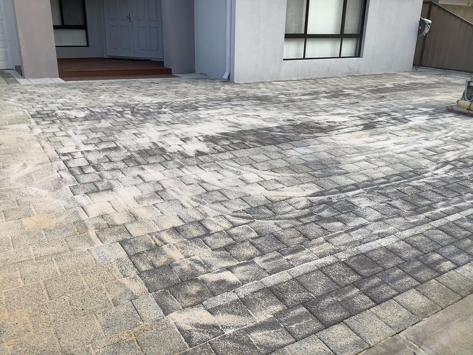 Wide paved driveway, freshly laid