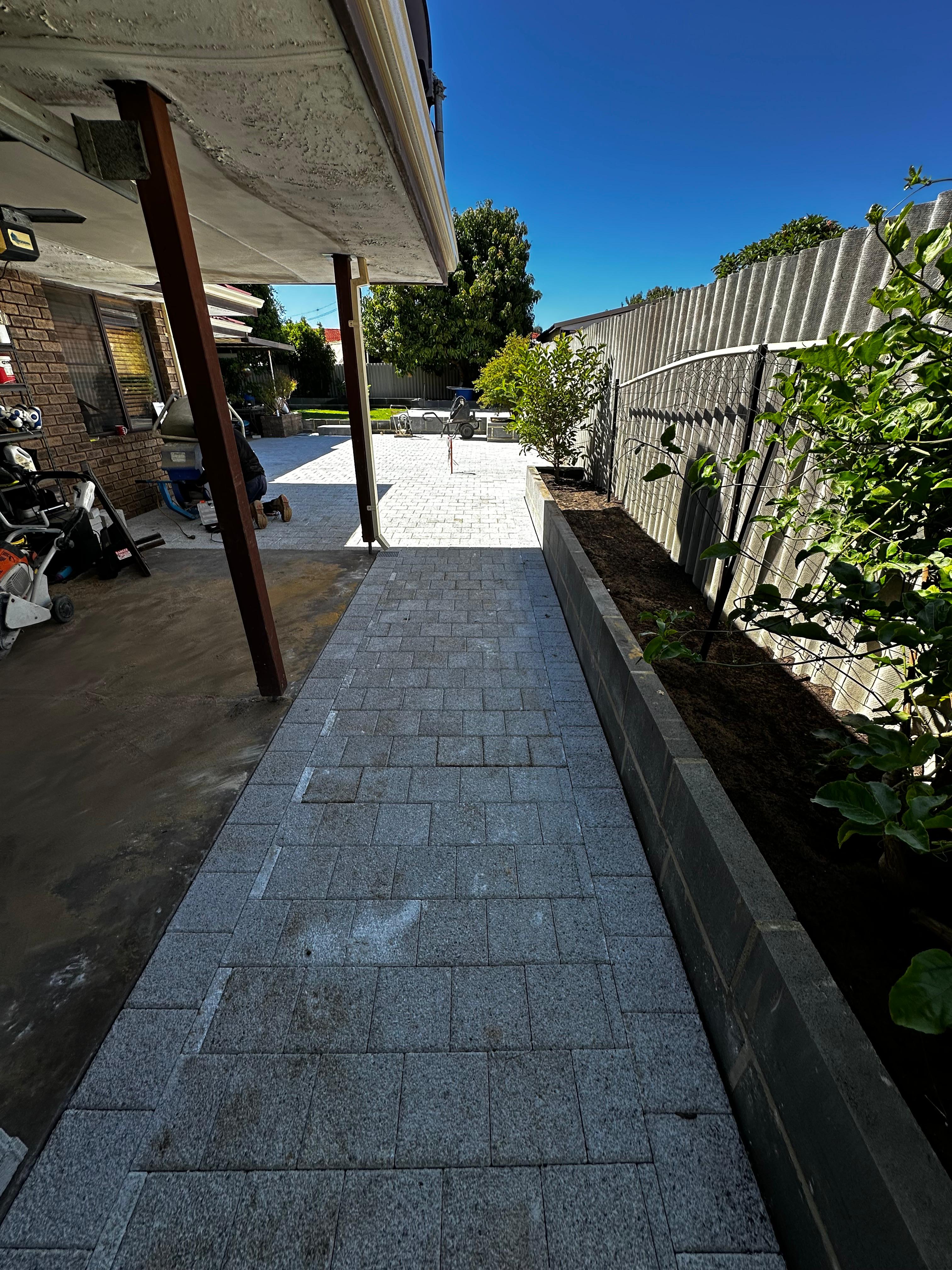 Paved side path alongside a house
