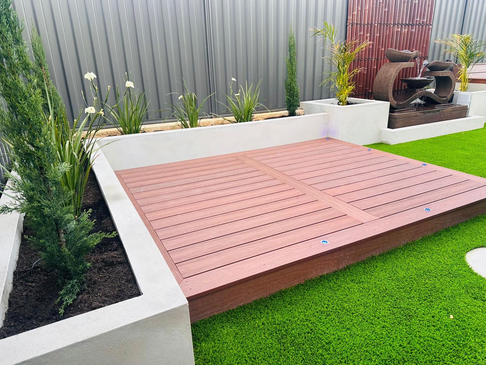 Composite deck platform with water feature in background